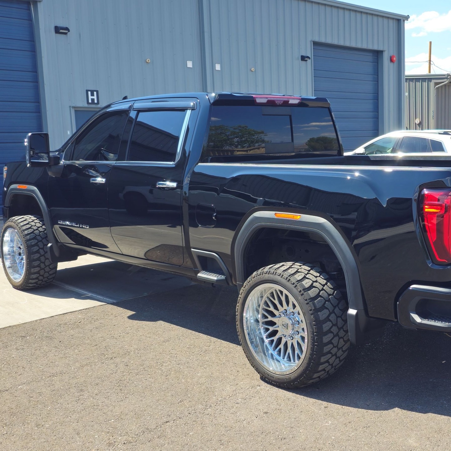 GMC Sierra Denali pickup after paint matching